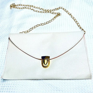 Faux Leather Winter White Envelope Clutch with Removable Gold Chain Strap.